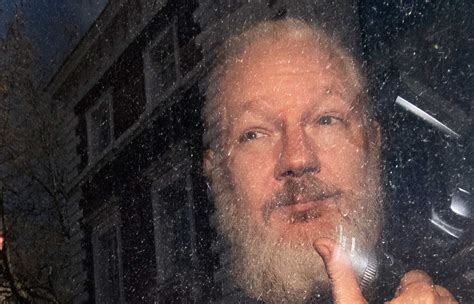 where was arrested julian assange
